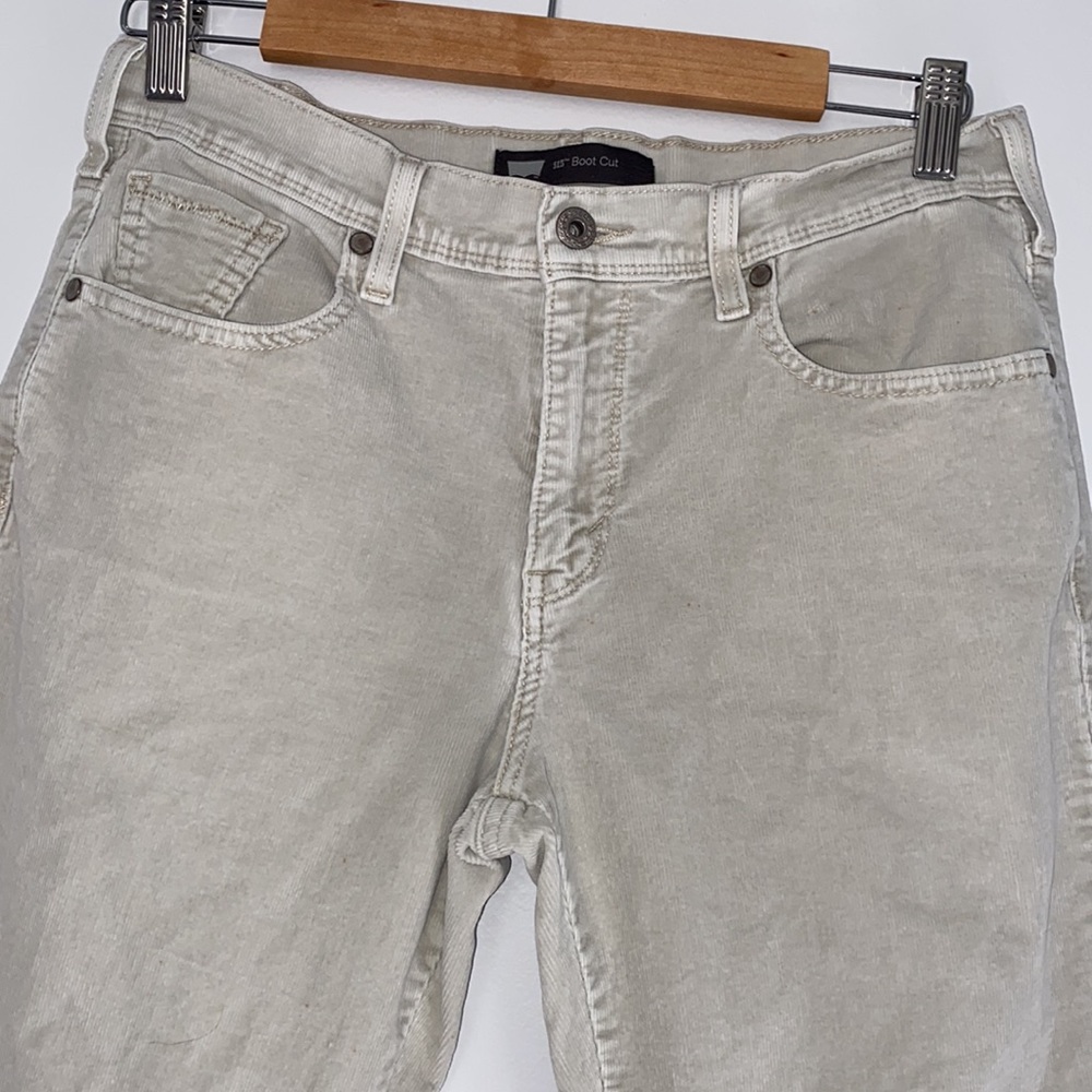 Levi’s women’s 515 boot cut cream corduroy pants.  Size 8M